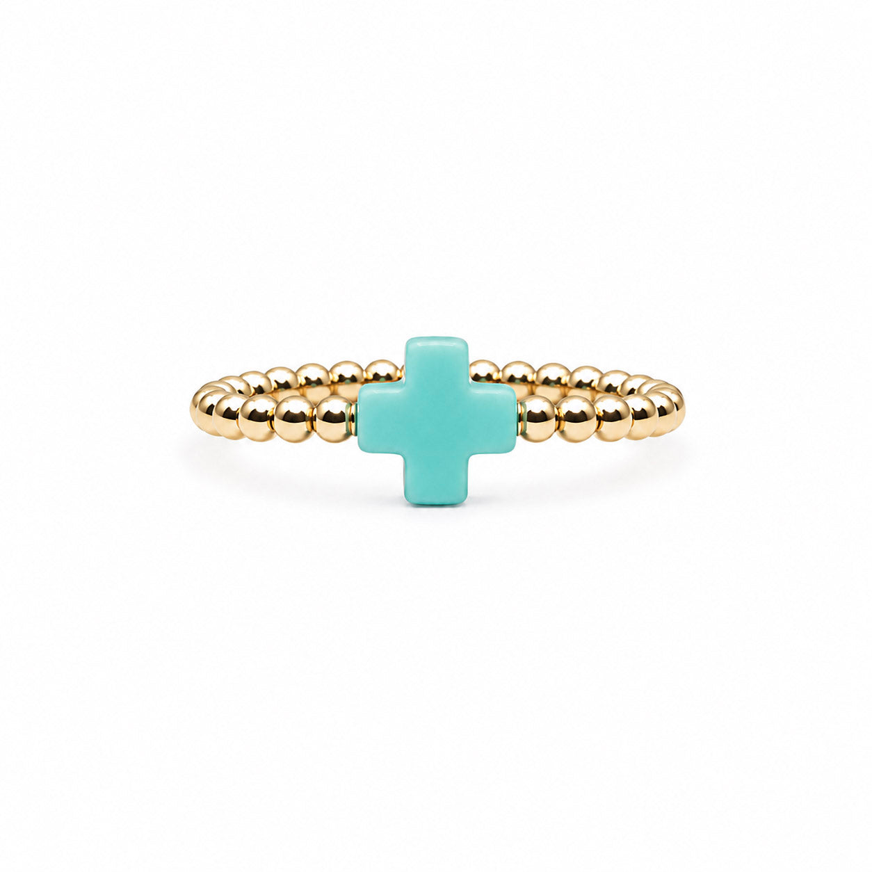 gold-filled beaded stretch ring with a turquoise cross charm.