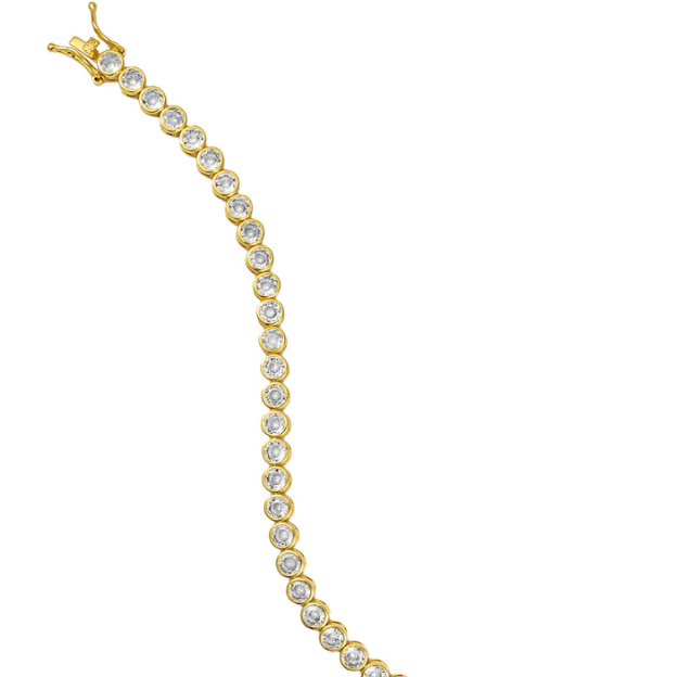 Gold bracelet with clear stones on a white background