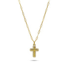 Gold cross necklace on a white background